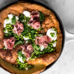 Savoury Dutch Baby with Ricotta, Peas, & Prosciutto - Milk